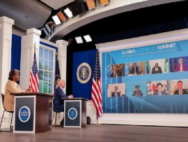 President Joe Biden listening to world leaders during the Global COVID-19 Summit
