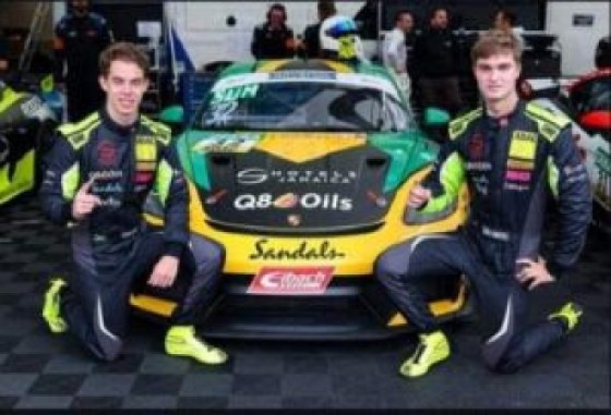 Jamaican race car drivers Tommi Gore (L) and Senna Summerbell