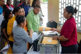 Teachers from various schools in Region Six receiving the school grant (File Photo)