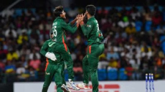Mahedi Hasan (left) celebrates one of his four wickets against West Indies in the opening T20I at Arnos Vale