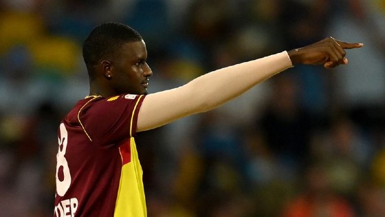 History-maker: Fast bowler Jason Holder celebrates after becoming the first West Indies bowler to take a hat-trick in Twenty20 Internationals on Sunday. (Photo via Sky Sports)