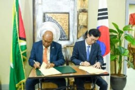 GEORGETOWN, Guyana – The Cheddi Jagan International Airport, Guyana and the Republic of Korea (South Korea) on Thursday, signed an Air Services Agreement to promote and facilitate airlines to operate air services between the two countries, as well as other countries. Signing the Agreement on behalf of South Korea was Ambassador KIM Jinhae, Non-Permanent Representative of the Republic of Korea to the Caribbean Community Secretariat and Bishop Juan Edghill, Minister of Public Works on behalf of Guyana. In addition to the standard articles of Grant of Rights; Designation and Authorisation; User Charges; Recognition of Certificates and Licenses; Customs Duties and Other Similar Charges; Tariffs; Commercial Activities, inter alia, Edghill said “this Agreement opens opportunity for airlines of both countries to expand their air connectivity and routes served.” Edghill further said that “the PPP/C Government has been aggressively working to connect destination Guyana with direct services to the various continents of the world.  When people see new airlines coming to Guyana, they must know that the PPP/C Government is working tremendously hard to make these things happen for the betterment of the Guyanese and the aviation industry.” Presently, there are no direct flights between Guyana and South Korea.  However, this Agreement puts in place the legal framework that opens market access for airlines to operate and enhance competitive air transport services, trade, and economic growth between the two countries.  Presently, Korean Air is the flag carrier of South Korea and is the largest airline in that country based on fleet size, international destinations, and international flights. It is anticipated that this Agreement will stimulate interest from Korean Air to consider destination Guyana as part of its route network. The Agreement complements the more than 50 Air Services Agreements Guyana has established with other ICAO States to develop air connectivity among States. Guyana and South Korea established diplomatic relations on October 2, 1969.