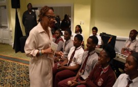CDB Acting Vice President of Operations, Mrs. Therese Turner-Jones speaks with students from the St. Georges High School at the launch of the BEST project