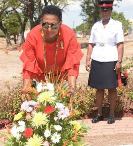 The Hon. Olivia Grange, Minister of Culture, Gender, Entertainment and Sport lays a floral arrangement on the shrine of Dr. the Hon. Louise Bennett-Coverley, Miss Lou, during A Special Gathering, a floral tribute in celebration of the 100th anniversary of the birth of this beloved cultural icon. The celebratory event was held on Miss Lou’s Birthday, September 7 at the National Heroes Park in Kingston.