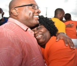 “Harris, left, and supporter” 