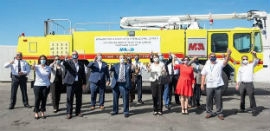 Commissioner Diaz, center, joins a host of officials at PortMiami for the donation of a fire truck to Guatemala.