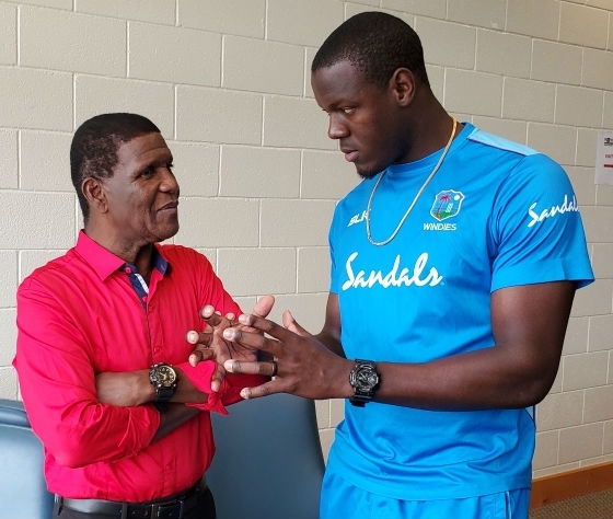 Brathwaite, right, has a talk with Rowe in Florida. Photograph by Gordon Williams.