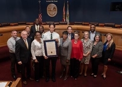 Miami-Dade Transit bus operator Elijah Saleem receives a commendation at the March 5 County Commission meeting. (Photos by Ryan Holloway / Miami-Dade County)  