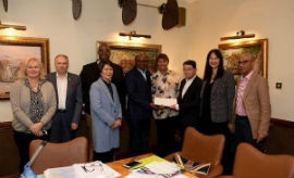 Minister of Tourism and Co-Chair of the Global Tourism Resilience and Crisis Management Centre (GTRCM), Hon Edmund Bartlett (center) and Dr. Taleb Rifai, Co-Chair of the GTRCM and former Secretary General of the UNWTO (3nd right), hand over US$50,000 for relief efforts to Director General of the Ministry of Tourism and Aviation of the Bahamas (4th right). Sharing in the moment from left to right are GTRCM Board Members, Daniela Wagner, Head of International Partnerships at Jacobs Media Group; Mario Hardy, Chief Executive Officer of the Pacific Asia Travel Association; DHO Young-Shim, Chair UN SDGs Advocate Alumni; Executive Director of the GTRCM, Professor Waller; Elena Kountoura, former Minister of Tourism for Greece and Ibrahim Ayoub, Group CEO of Daiichi. The occasion was the second Board of Governors meeting of the GTRCM in London.