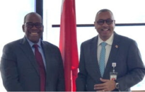 The CDB’s Alexander Augustine (left) and Planning, Economic Affairs and Development Minister, Dr. Kennedy Swaratsingh.