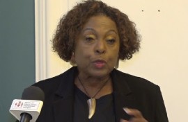 Jamaica’s Culture, Gender, Entertainment and Sport Minister, Olivia Grange, speaking to reporters after presenting petition to King Charles (CMC Photo)