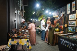 File photo: Patrons browse handcrafted jewellery, leather goods and artwork at a previous staging of Kingston Night Market.