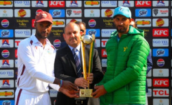 West Indies captain Kraigg Brathwaite (left) and Pakistan captain Shan Masood (right) pose with the winners’ trophy after the series ended in a 1-1 tie