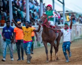 Fans celebrating Olympic Kremlin’s win in the 2024 President’s Cup. Photo: Kaieteur News