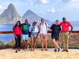 Pictured in front of St. Lucia’s famous Pitons twin peaks are (l-r) Francine Holder and Ernie George (Saint Lucia Tourism Authority); Simone Harvin (Bleu Magazine); Tyler Fox (Travel Off Path); Julian Belinque (Travel2Latam), and Jonathan Jn Baptiste of Anse Chastanet and Jade Mountain.