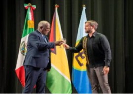 Prime Minister Mark Phillips performing a toast with Mexican Ambassador to Guyana, Mauricio Vizcaíno Crespo on the occasion of Mexico’s 215th Independence Anniversary