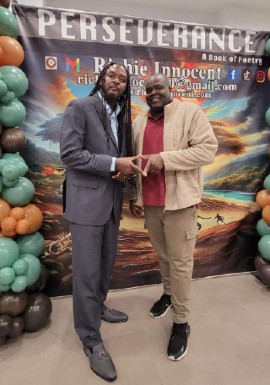 Marlon Wright (right) of Cyber Leaf Entertainment and Richie Innocent