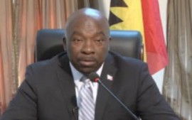 Information Minister Melford Nicholas at news conference