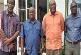 PNCR leader Aubrey Norton, second from left and AFC leader, Nigel Hughes, second from right, flanked by their respective party members ahead of the talks on Monday (CMC Photo)