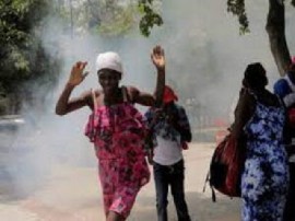 Haitian woman fleeing the violence in the capital, Port au Prince (File Photo)