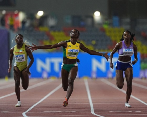 Alana Reid crosses the finish line to win the 100m at the 2024 World Athletics Under-20 Championships. (Photo copurtesy of World Athletics)