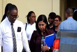 Representatives of the Ministry of Education and the Guyana Teachers Union emerge from their deliberations on Friday (GTU Photo)