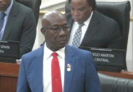 Prime Minister Dr. Keith Rowley responding to questions about election observers in Parliament (CMC Photo)