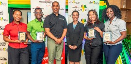 From left to right:-  Birthright Interns Kyrah Mcintosh, Josiah Royes, GraceKennedy Group CEO Frank James, Minister of Foreign Affairs and Foreign Trade The  Honourable Kamina Johnson Smith, and  Interns Lauren Roach and Abigail Ralph.