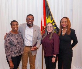 Colin James, CEO of the Antigua and Barbuda Tourism Authority, and Vanessa Ledesma, Acting CEO and Director General of CHTA, celebrate the announcement at CTO’s State of the Tourism Industry Conference (SOTIC) in the Cayman Islands this week. At left is Sandra Joseph, Permanent Secretary in the Ministry of Tourism, while Dona Regis-Prosper, CTO Secretary-General and CEO is pictured at right.
