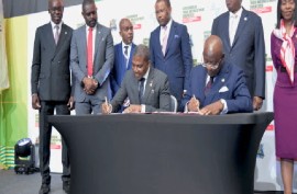 Prime Minister Dr. Terrance Drew signing Heads of Terms agreement with the African Export-Import Bank (Afreximbank).