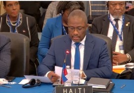 Haiti’s Foreign Affairs Minister, Jean Victor Harvel Jean-Baptiste, speaking at the ceremony welcoming the new OAS Secretary General, Albert Ramdin (CMC Photo)