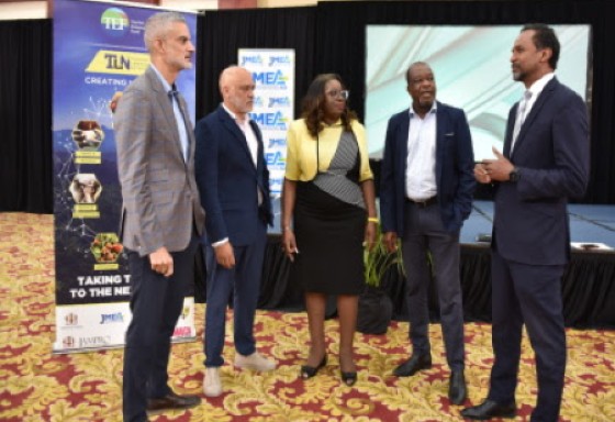 Tourism Enhancement Fund (TEF) executive director Dr. Carey Wallace (right) shares a moment with industry leaders (from left) Sydney Thwaites, President of the Jamaica Manufacturers and Exporters Association; Robin Russell, President of the Jamaica Hotel and Tourist Association; Carolyn McDonald-Riley, Director of TEF’s Tourism Linkages Network; and Clifton Reader, Vice President of Palace Resorts for Jamaica and Turks and Caicos during the 10th anniversary celebration .